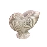 maison coquillage nautilus house Design nautilus élégant : inspirée par la symétrie de la vie marine, cette sculpture de coquillage blanc ajoute un charme côtier serein à n'importe quel espace.