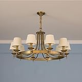 1. **Élégance vintage** : Ce lustre en cuivre de style campagnard américain apporte une touche à la fois rustique et raffinée à toute pièce. Idéal pour les salons, les salles à manger, les chambres et les villas, son design original en bronze s’harmonise avec les intérieurs traditionnels.