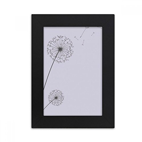 Foto de la flor de escritorio en marco negro 5x7 de diente de león para decorar tu oficina 2