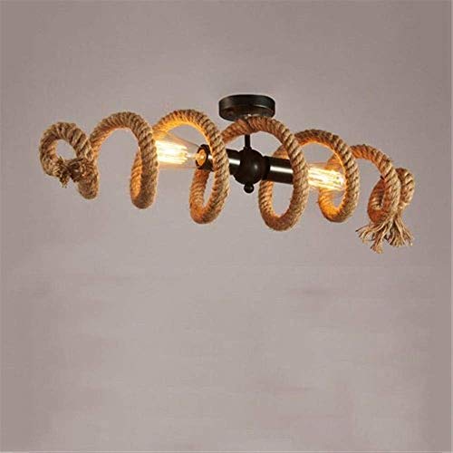 Suspension industrielle vintage en fer pour éclairer efficacement un comptoir de bar