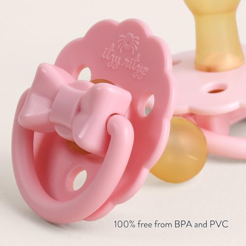 Image of Itzy Ritzy Natural Rubber Pacifiers - Baby Pacifiers with Cherry-Shaped Nipple & Large Air Holes for Added Safety - Set of 2 Binkies in Light & Dark Pink Bows (Ages 0 - 6 Months)