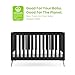 Delta Children Essex 4-in-1 Convertible Baby Crib, Ebony with Natural Legs
