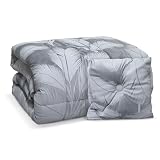 Design Elegante: Decorata con una sofisticata fantasia di foglie di palme e abbinata a un cuscino arredo coordinato, per aggiungere un tocco di classe alla tua camera da letto.