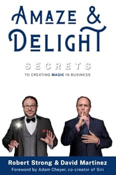 Paperback Amaze & Delight: Secrets to Creating Magic in Business Book