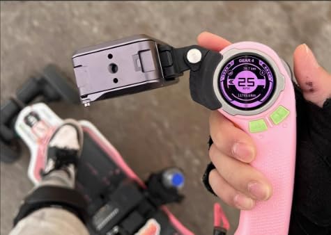 Hand holding Exway Rexus Remote with RXM Extension and an attached camera.