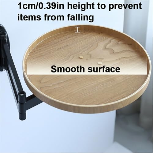 Table murale ronde pliante pour un coin repas de studio optimisé