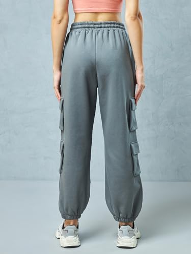 Image of Bewakoof Women's Fleece Super Loose Fit Joggers|Bewakoof Heavy Duty 1.0 | Track pants for woman | Lower for women | Multipurpose | Activewear | Utility Pockets | Lightweight & Flexible Elastic Waist | Casual Joggers | Loose Fit