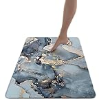 Préserve l'intégrité du sol : Le sous-tapis antidérapant inclus non seulement maintient le tapis de bain absorbant en terre de diatomées en place, mais protège également votre sol de salle de bain contre les rayures, les taches et les dégâts d'eau. Cela assure que votre sol reste intact