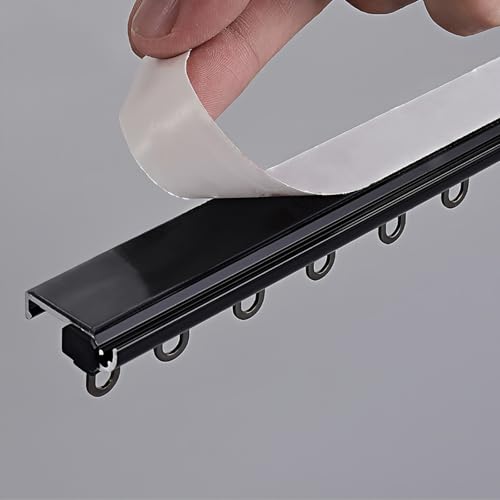 Riel deslizante autoadhesivo sin taladro para baño con acabado negro liso y fácil montaje