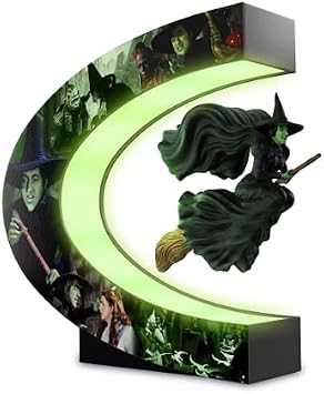 تبادل برادفورد ساحر OZ Wicked Witch of the West الذي يرفع نحت الراتنج الذي يضم مونتاجًا من المشاهد من الفيلم الكلاسيكي على القاعدة المضيئة