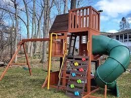 KidKraft Cedar Summit Play Center showing the rock wall and ladder