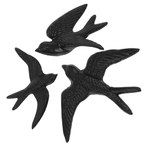 Décoration murale en fonte oiseau noir : habillez vos murs vides facilement