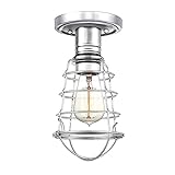 Lanterne murale extérieure en fonte d'aluminium avec une finition noir/argent et des panneaux de verre texturé. Évalué IP44.