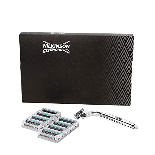 Wilkinson Sword Quattro Titanium Rakhyvel + 8 Ersättningsblad