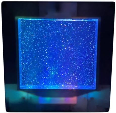 Close-up of the Playlearn Sensory Light displaying a calming blue color with glitter movement