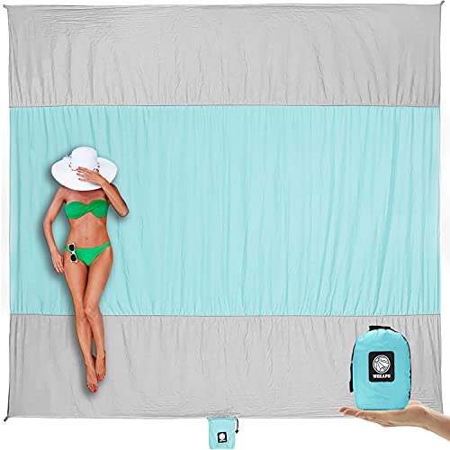 Image of WEKAPO Beach Blanket Sandproof Waterproof, Extra Large Beach Mat, Oversized & Compact Sand Free, Quick Drying Beach Essentials for Vacation, Cruise, Picnic & Camping with Stakes