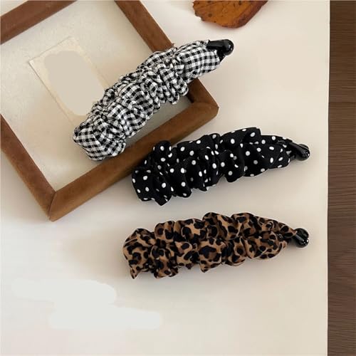Pinzas de plátano que muestran el volumen del cabello con lunares y leopardo 2