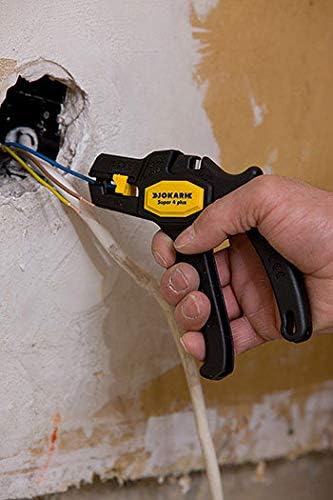 Using JOKARI wire stripper in a wall opening