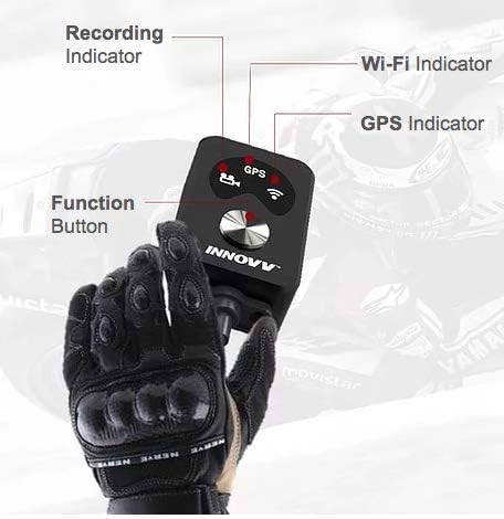 INNOVV K5 remote control held by a gloved hand
