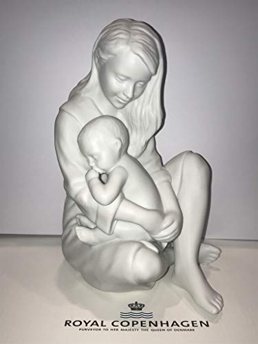 Mãe com bebé dormindo em Biscuit