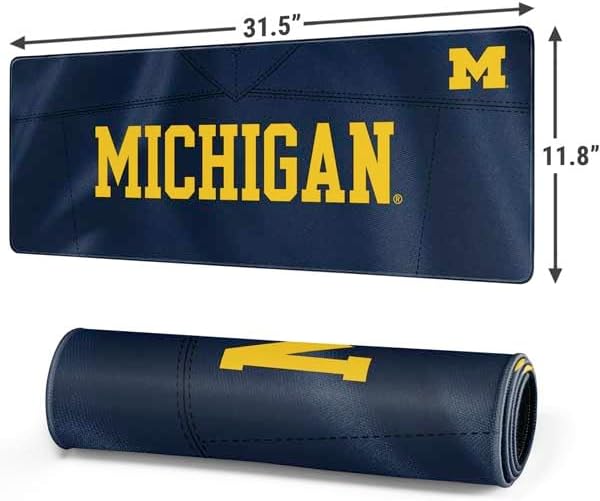 Skinit Large Gaming Mouse Pad - Officially Licensed University of Michigan Blue Jersey Design with Stitched Edges, Waterproof, Non-Slip Rubber Base, Desk Mat for Keyboard & Mouse, 31.5" x 11.8" inches