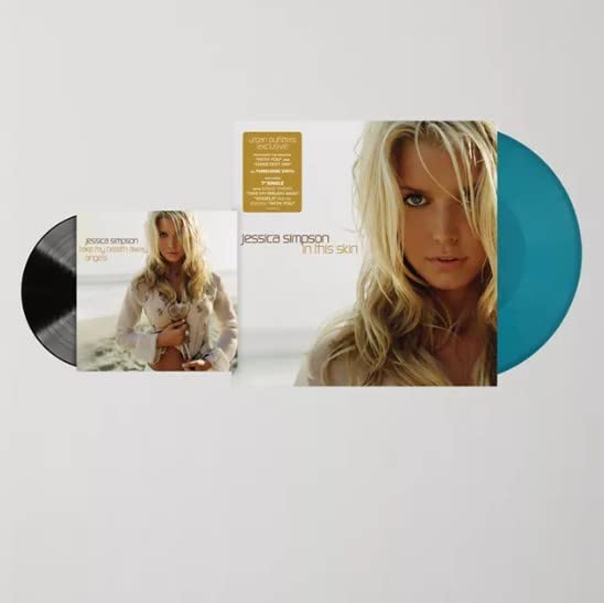 In This Skin - Exclusive Limited Edition Turquoise Colored Vinyl Includes 7" Single With Bonus Tracks