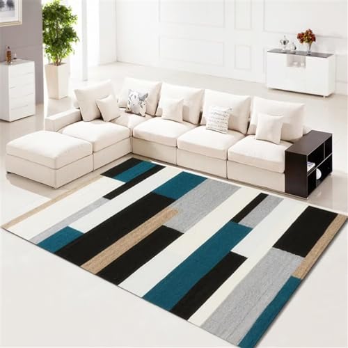 Tapis rectangulaire bleu à larges rayures géométriques et moquette durable de chambre