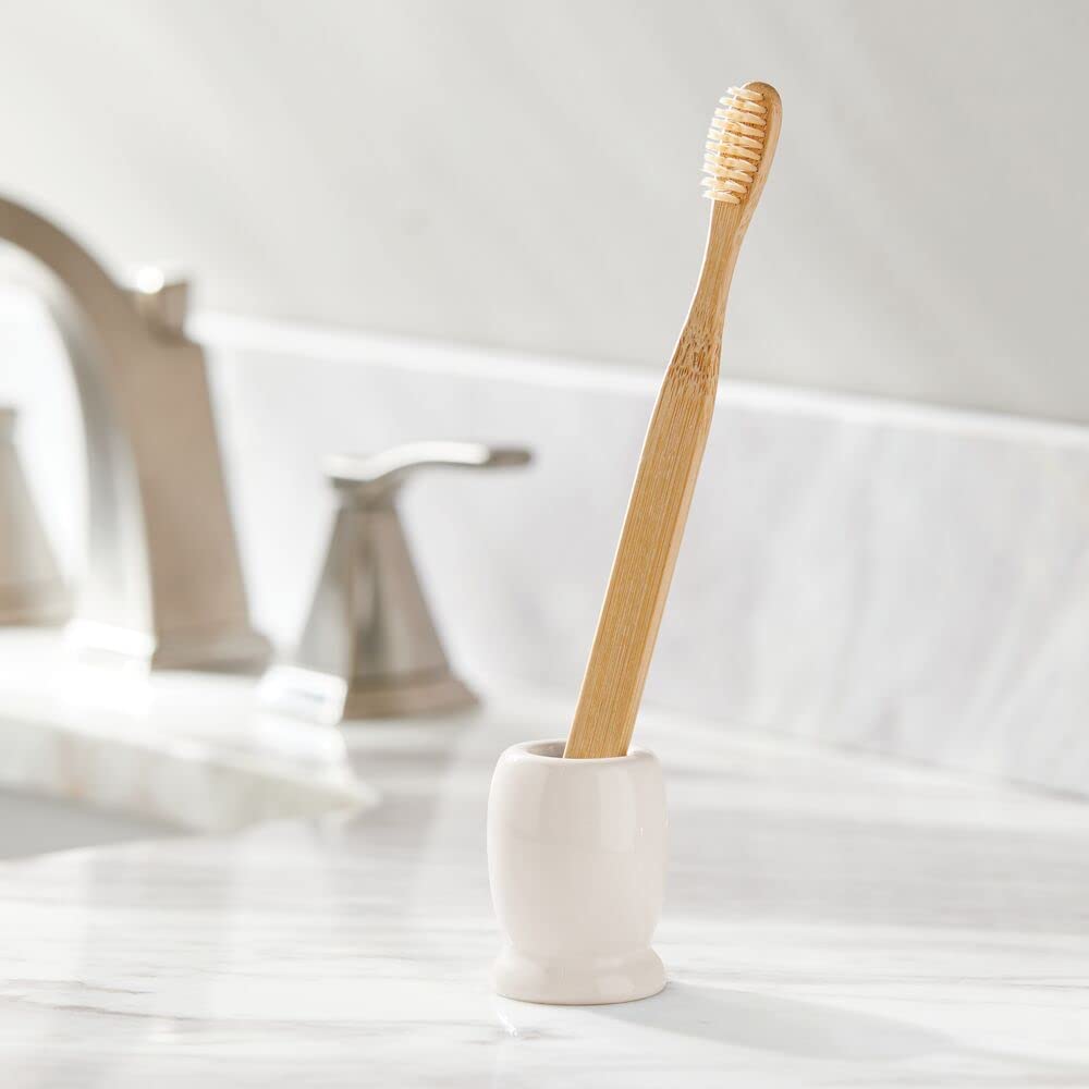 mDesign - Tandenborstelhouder voor enkele tandenborstel - voor badkamer - voor wastafel of medicijnkastje - rond/keramisch/klein/vrijstaand - crème - per 4 stuks verpakt