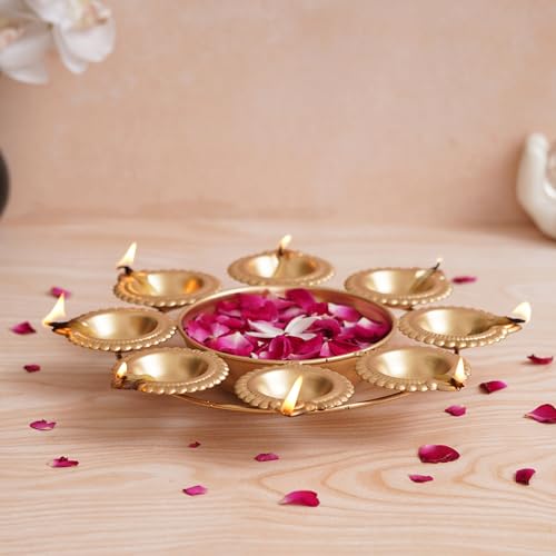 Image of eCraftIndia Golden Metal Handcrafted Decorative Urli with 8 Diyas | Urli Bowl for Home Decor | Urli for Floating Flowers | Diwali Decoration Items for Home Decor | Housewarming Diwali Gift