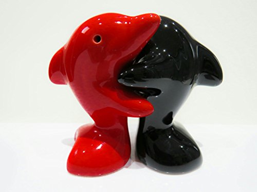 Diseño de delfín que se adapta al de salero y pimentero los amantes de los. Negro y rojo 8 cm de alto.