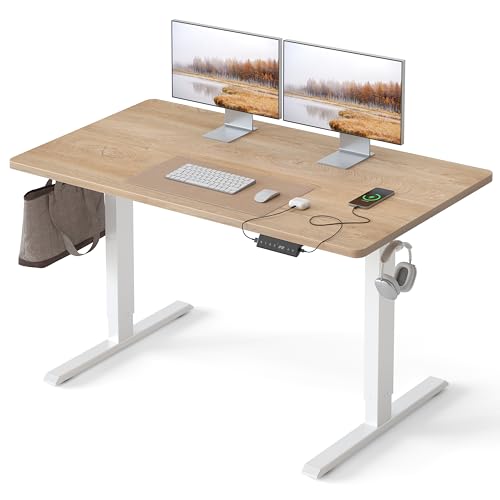 FEZIBO Höhenverstellbarer Schreibtisch EINTEILIGER Tischplatte, 140 x 60 cm Schreibtisch Höhenverstellbar mit USB-A und USB-C-Ladeanschlüssen, Steh-Sitz Tisch für Heimbüro, Standing Desk, Eiche