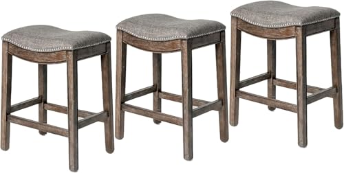 Image of Maven Lane Adrien Backless Counter Stool - Set of 3 - 26 Inches - Saddle Stool with Footrest - Brown Solid Wood Frame & Grey Fabric Upholstery - Perfect for Kitchen Islands & Counters