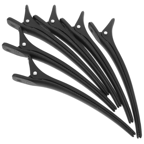 Pinzas de peluquería para organizar el cabello dañado en casa