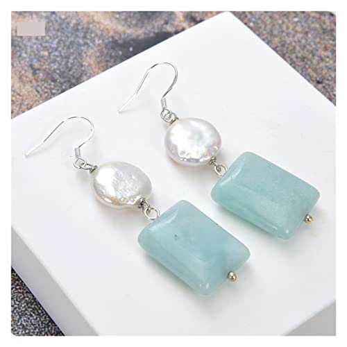 Boucles d'oreilles perle blanche idéales pour illuminer vos tenues de bureau
