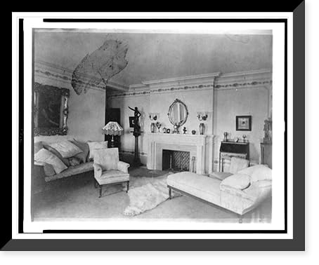 Historic Framed Print, [Bedroom with fireplace, padded chaise longue, sofa, male nude statuette, and polar bear rug, in home of Edmund Cogswell Converse, Greenwich, Connecticut], 17-7/8' x 21-7/8'
