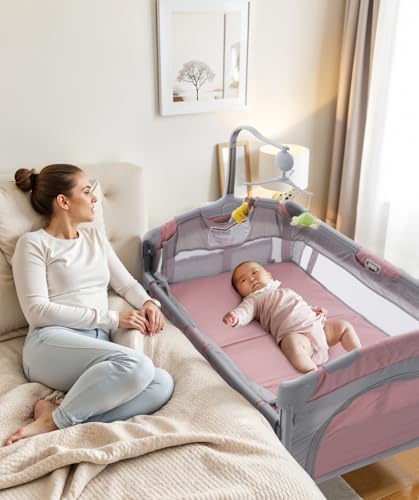 Image of Soobaby 5 in 1 Baby Crib,Bedside Sleeper,Bassinet,Pack and Play with Bassinet and Changing Table,Portable Travel Playpen Music Box,Portable Travel Crib for Infant Newborn (Pink Gray)