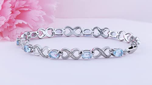 Dazzlingrock Collection Real Oval Cut Blue Topaz & Round White Diamond Infinity Link Bracelet, Sterling Silver #TOP1