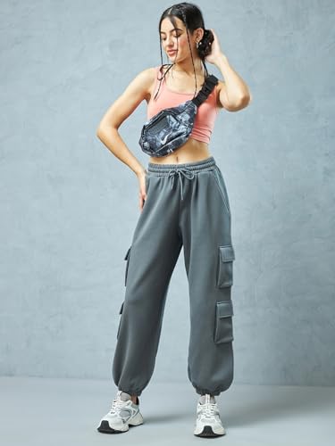 Image of Bewakoof Women's Fleece Super Loose Fit Joggers|Bewakoof Heavy Duty 1.0 | Track pants for woman | Lower for women | Multipurpose | Activewear | Utility Pockets | Lightweight & Flexible Elastic Waist | Casual Joggers | Loose Fit