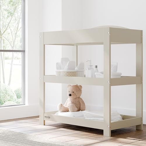 Image of Graco Customizable Changing Table with Water-Resistant Changing Pad (Frosted Oat) - Customizable Modern Flat or Classic Arched Headboard, Changing Pad Included
