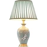 Corps de lampe en céramique fabriqué à la main, délicat et transparent, de forme pleine, naturel simple et rempli de vitalité.