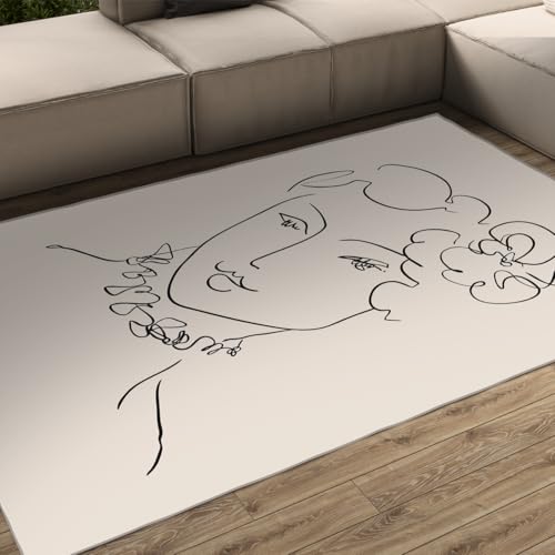 Tapis salon vert sauge abstrait pour créer une ambiance chambre cocooning