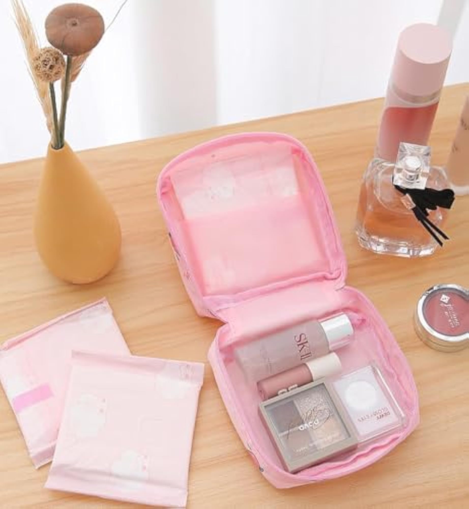 Compact Travel Pouch for Sanitary Napkin Storage