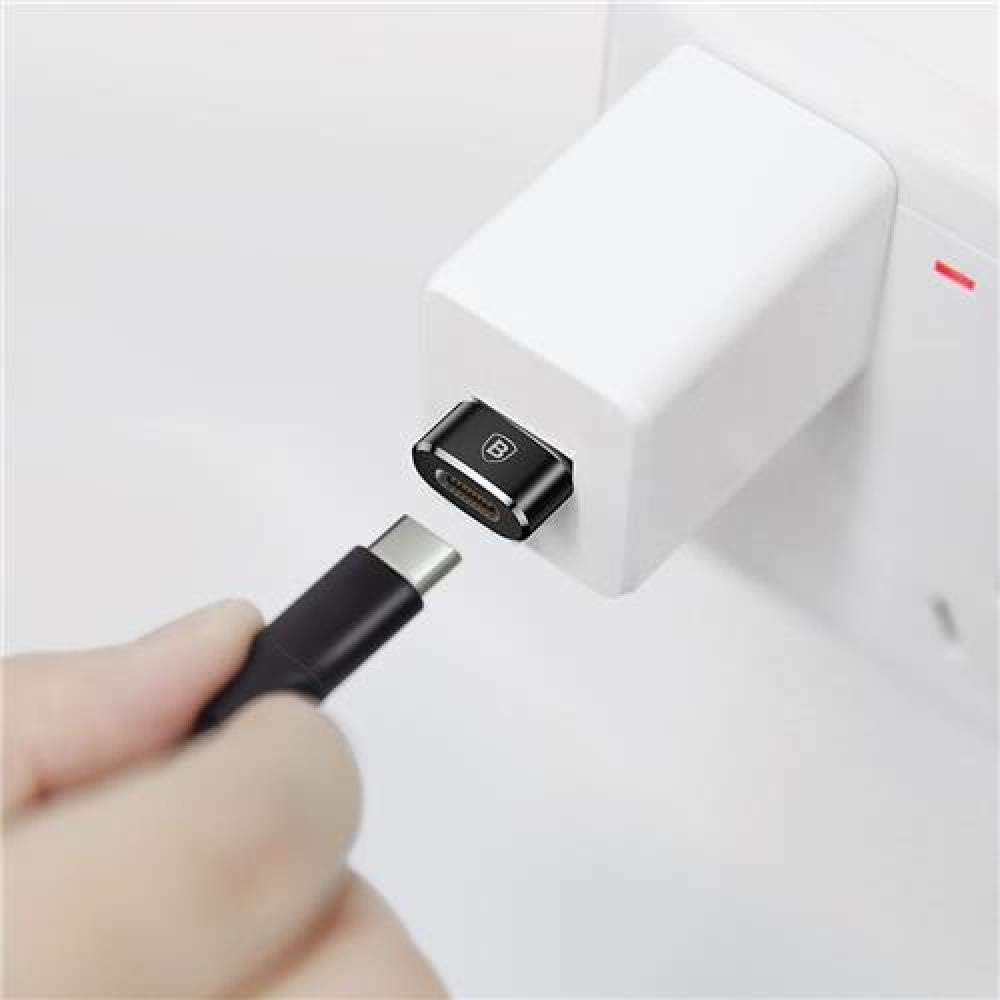 Baseus Mini Type-C to USB Adapter connected to a wall charger with a USB-C cable