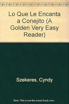 Paperback Lo Que Le Encanta A Conejito (Road to Reading) Book