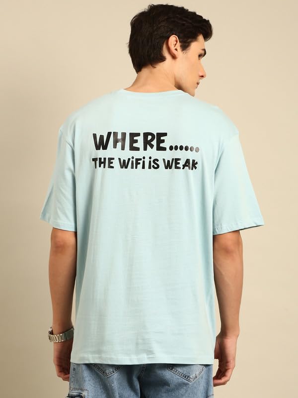 Back view of the white oversized t-shirt with 'WHERE...... THE WIFI IS WEAK' typography print.