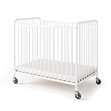 Foundations Chelsea Slatted Metal Compact Daycare Crib, 3' Casters, Compact Mini Size, Easy to Clean Durable Finish, Adjustable to Two Heights Mattress Board (White)