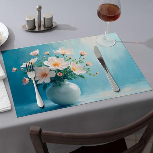 Sets de table fleurs blanches et vase doré pour sublimer vos dîners en famille