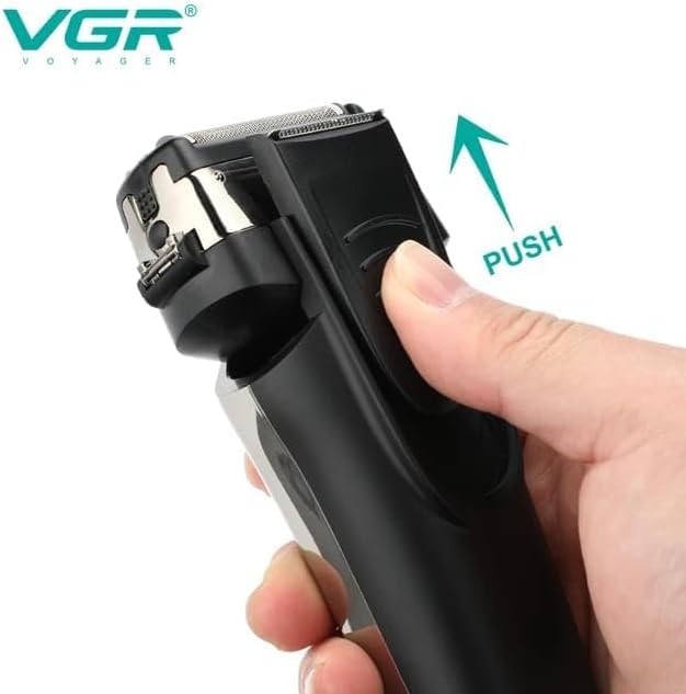 A hand demonstrating how to open the shaver head by pushing a button or lever.