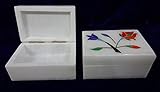 The inlay work adds a touch of elegance and sophistication to the jewelry box.