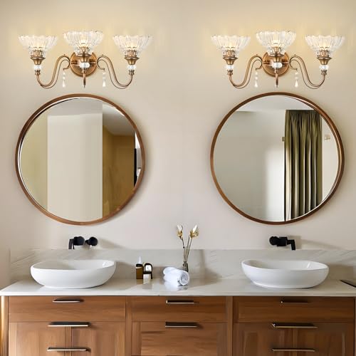 Image of Vintage Bathroom Vanity Light, 3-Light Matte Antique Brass Finish Wall Sconce with Hanging Crystal Accents and Flower-Shaped Clear Glass Shades, Retro Wall Mount Vanity Light Over Mirror for Bathroom